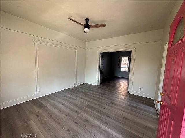 3499 Lemon St, Riverside, CA 92501 - unfurnished bedroom featuring baseboards, a ceiling fan, and dark wood-type flooring