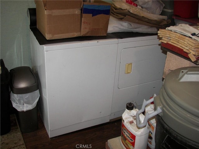 laundry room with laundry area and dark wood-style floors