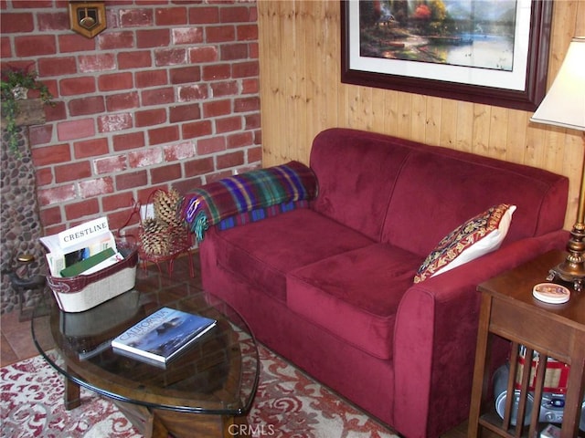living area with wooden walls