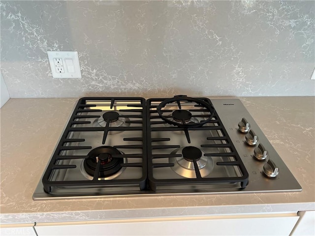 details featuring stainless steel gas stovetop