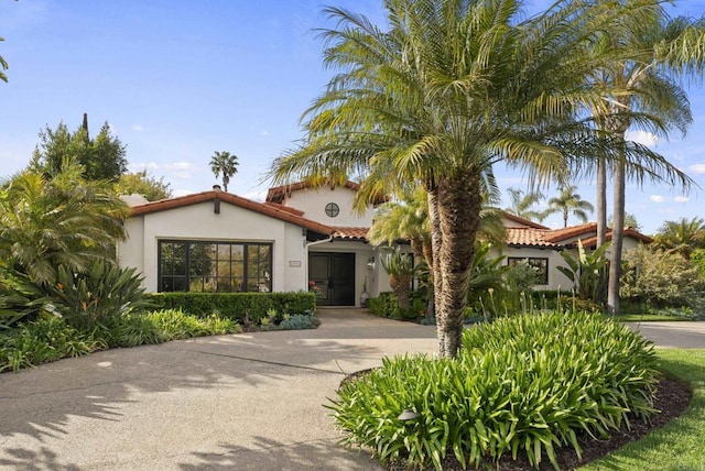 17182 Camino Acampo, Rancho Santa Fe, CA 92067 - mediterranean / spanish-style house featuring a tiled roof and stucco siding