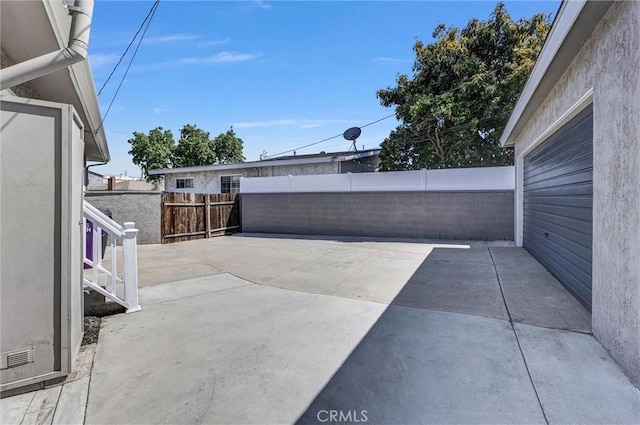 view of patio featuring a fenced backyard