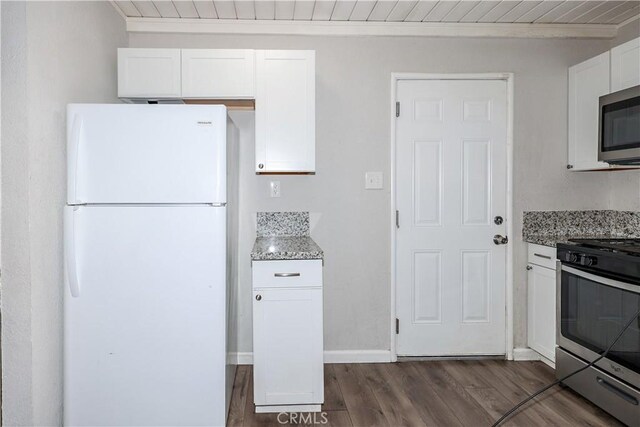 kitchen featuring wood ceiling, light stone countertops, stainless steel appliances, white cabinetry, and dark wood-type flooring