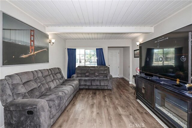 living room with wood ceiling, baseboards, beam ceiling, and wood finished floors