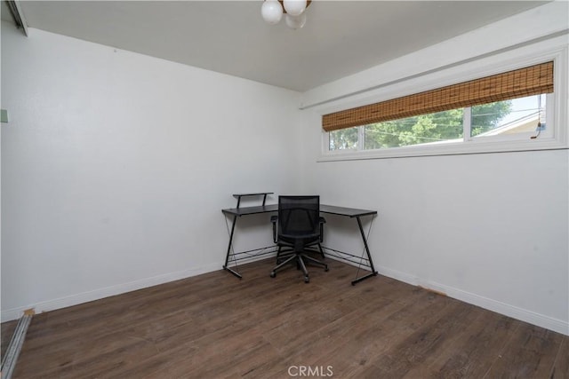 office featuring wood finished floors and baseboards