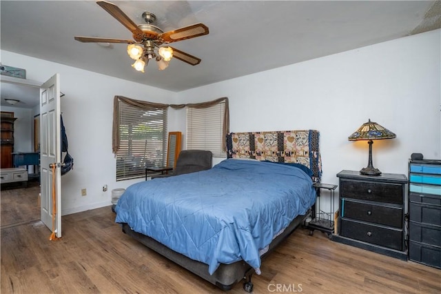 9810 Sharon Ave, Riverside, CA 92503 - bedroom with wood finished floors and a ceiling fan