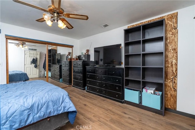 9810 Sharon Ave, Riverside, CA 92503 - bedroom with wood finished floors and a ceiling fan