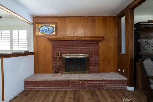 9810 Sharon Ave, Riverside, CA 92503 - unfurnished living room with a fireplace and wood finished floors