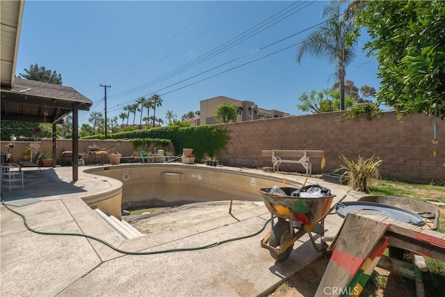 9810 Sharon Ave, Riverside, CA 92503 - fenced backyard with a patio