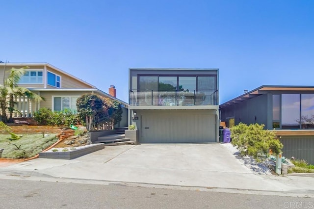 view of front of home featuring a garage and driveway