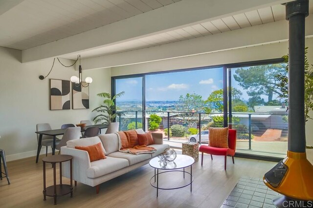 936 Bangor St, San Diego, CA 92106 - living area with wood finished floors, beamed ceiling, baseboards, and wood ceiling