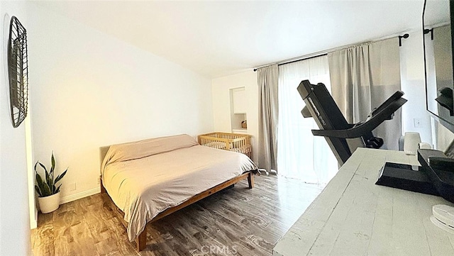 1921 Glenoaks Blvd Unit 196, San Fernando, CA 91340 - bedroom featuring wood finished floors and baseboards