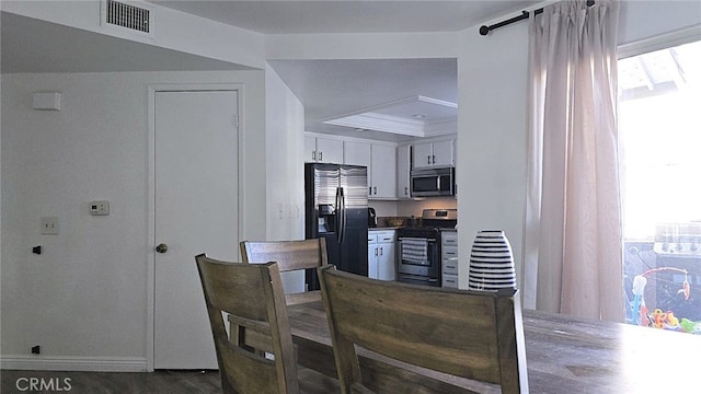 1921 Glenoaks Blvd Unit 196, San Fernando, CA 91340 - kitchen featuring stainless steel appliances, white cabinets, dark wood finished floors, and a raised ceiling