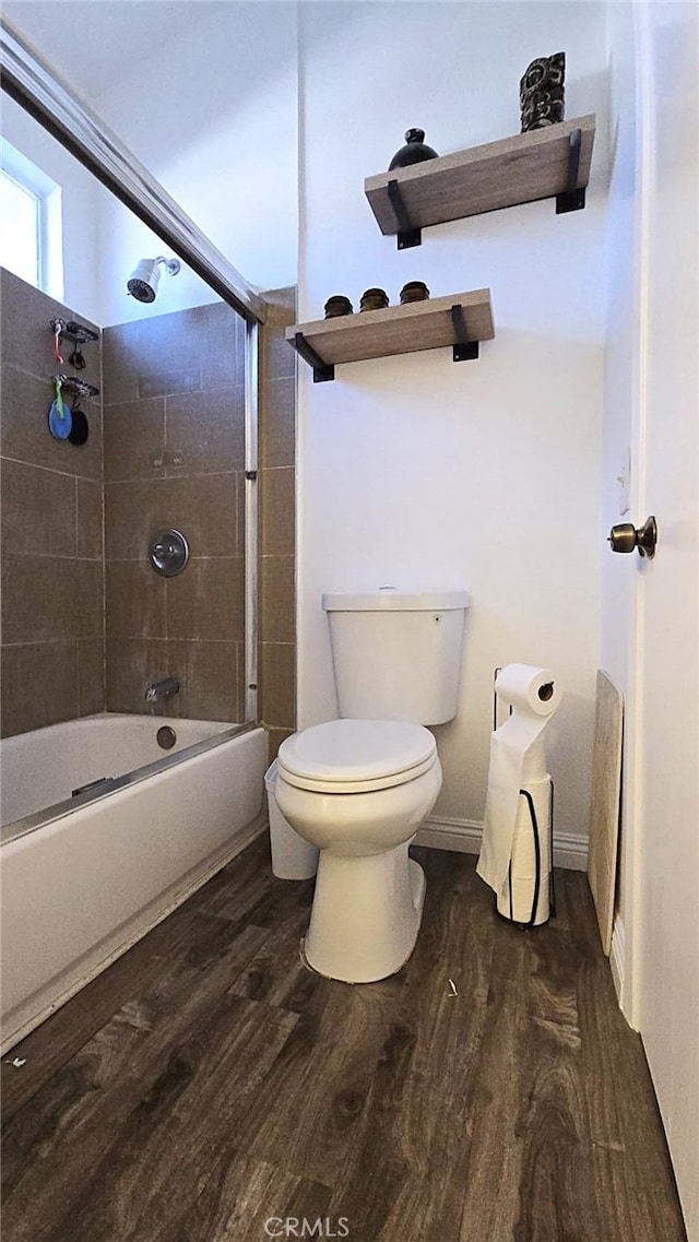 1921 Glenoaks Blvd Unit 196, San Fernando, CA 91340 - bathroom with toilet, baseboards, bathtub / shower combination, and wood finished floors