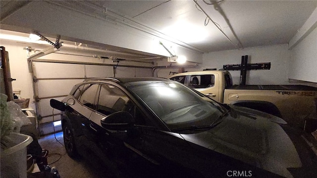 1921 Glenoaks Blvd Unit 196, San Fernando, CA 91340 - garage featuring a garage door opener