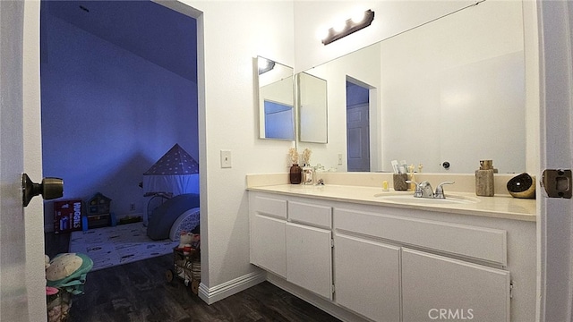 1921 Glenoaks Blvd Unit 196, San Fernando, CA 91340 - bathroom featuring wood finished floors, double vanity, and ensuite bath