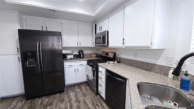 1921 Glenoaks Blvd Unit 196, San Fernando, CA 91340 - kitchen with stainless steel appliances, crown molding, dark wood finished floors, white cabinets, and a tray ceiling