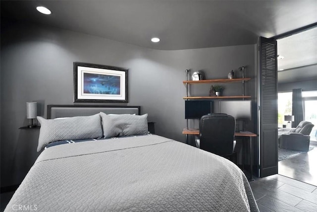 13784 Choco Rd, Apple Valley, CA 92307 - bedroom with dark wood-type flooring, recessed lighting, and an office area