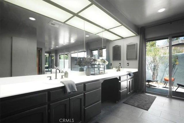 13784 Choco Rd, Apple Valley, CA 92307 - full bathroom featuring double vanity, recessed lighting, and tile patterned flooring