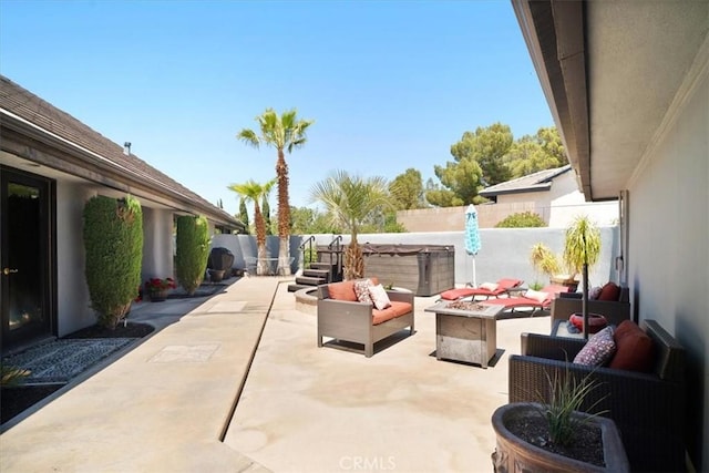 13784 Choco Rd, Apple Valley, CA 92307 - view of patio / terrace with an outdoor living space with a fire pit and a fenced backyard