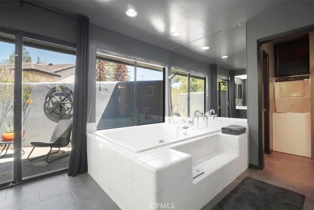 13784 Choco Rd, Apple Valley, CA 92307 - bathroom featuring tile patterned flooring, a whirlpool tub, and recessed lighting