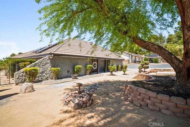 13784 Choco Rd, Apple Valley, CA 92307 - view of front of house featuring roof mounted solar panels