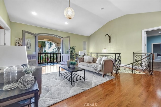 9371 Florence Ave, Downey, CA 90240 - living area with vaulted ceiling and wood finished floors