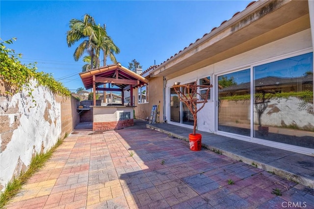 9371 Florence Ave, Downey, CA 90240 - view of patio / terrace featuring fence, outdoor dry bar, and a gazebo