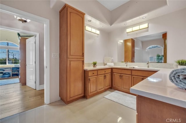 9371 Florence Ave, Downey, CA 90240 - bathroom with vanity and baseboards
