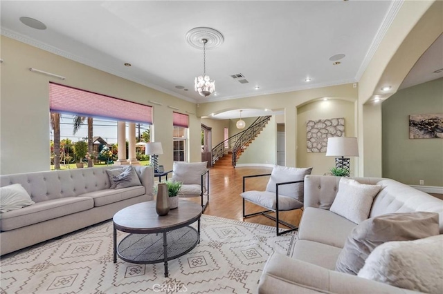 9371 Florence Ave, Downey, CA 90240 - living room featuring stairway, baseboards, light wood finished floors, and a notable chandelier