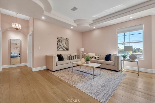 9371 Florence Ave, Downey, CA 90240 - living room featuring recessed lighting, baseboards, visible vents, and light wood finished floors