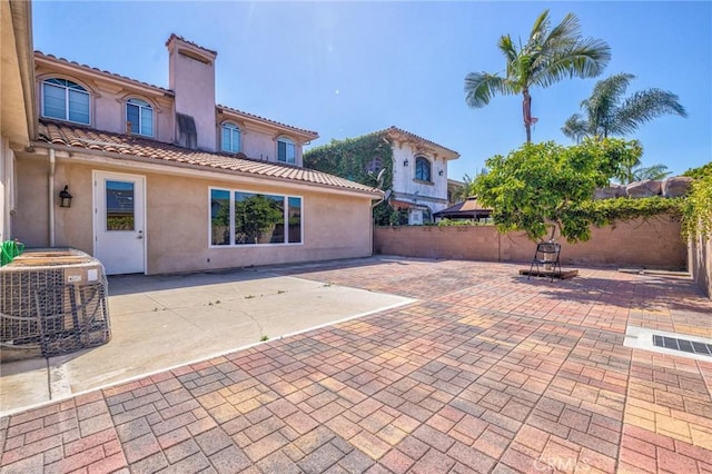 9371 Florence Ave, Downey, CA 90240 - view of patio with a fenced backyard and central air condition unit