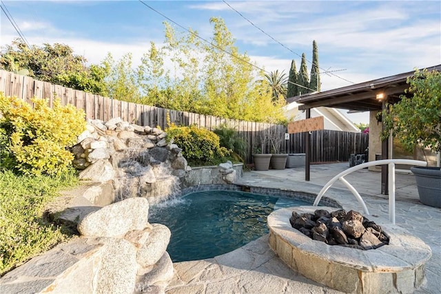 24511 Bridger Rd, Lake Forest, CA 92630 - view of swimming pool featuring a patio, a fire pit, and a fenced backyard