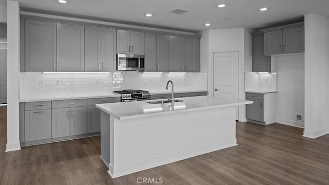 33328 Rusty Ct, French Valley, CA 92596 - kitchen with a sink, appliances with stainless steel finishes, gray cabinetry, and recessed lighting
