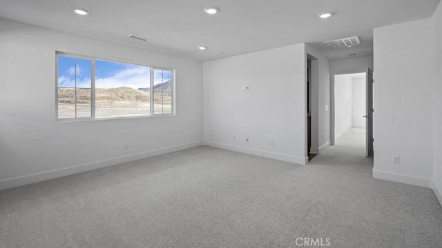 33328 Rusty Ct, French Valley, CA 92596 - unfurnished room with baseboards, light colored carpet, recessed lighting, and visible vents