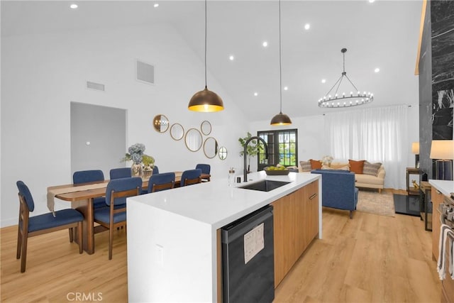 335 N Harvard Blvd, Los Angeles, CA 90004 - kitchen with dishwasher, high vaulted ceiling, modern cabinets, light wood-type flooring, and a center island with sink