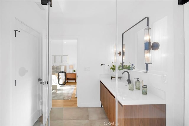 335 N Harvard Blvd, Los Angeles, CA 90004 - full bathroom with vanity and baseboards