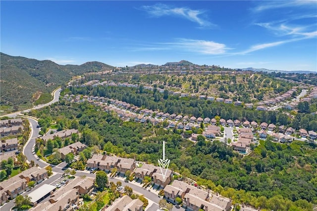aerial view featuring a mountain view and a residential view