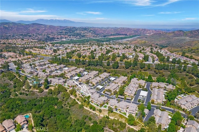 aerial view featuring a mountain view and a residential view