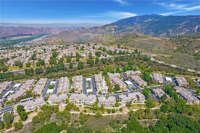 aerial view featuring a mountain view and a residential view