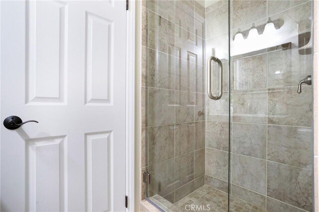 bathroom with a stall shower