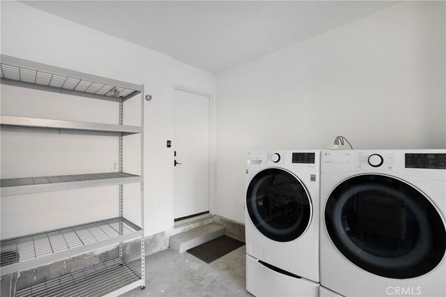 laundry area featuring laundry area and independent washer and dryer