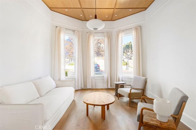 sitting room with wooden ceiling, baseboards, recessed lighting, and wood finished floors