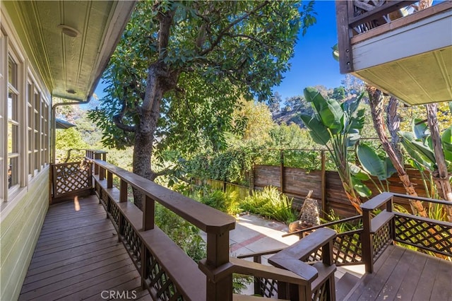 wooden deck featuring fence