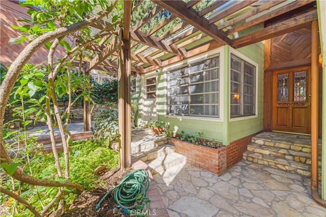 exterior space featuring a pergola