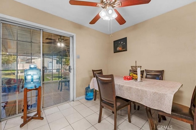 4185 E Turner Ave, Fresno, CA 93702 - dining room featuring a ceiling fan, baseboards, and light tile patterned floors