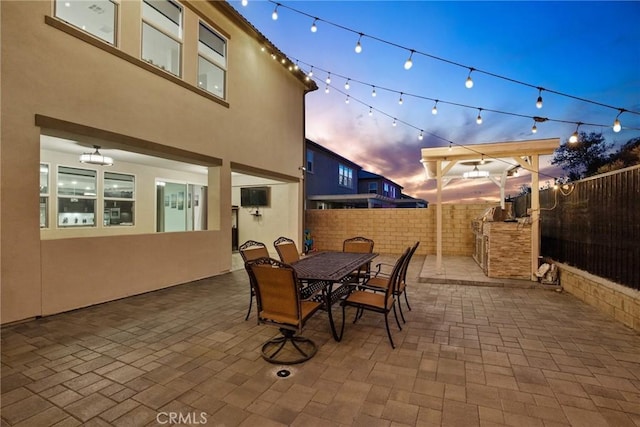 view of patio with a fenced backyard and outdoor dining space