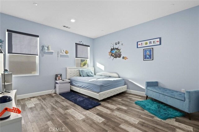 19183 Bension Dr, Saugus, CA 91350 - bedroom featuring wood finished floors and recessed lighting