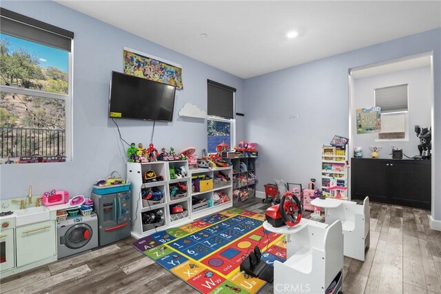 19183 Bension Dr, Saugus, CA 91350 - playroom with wood finished floors