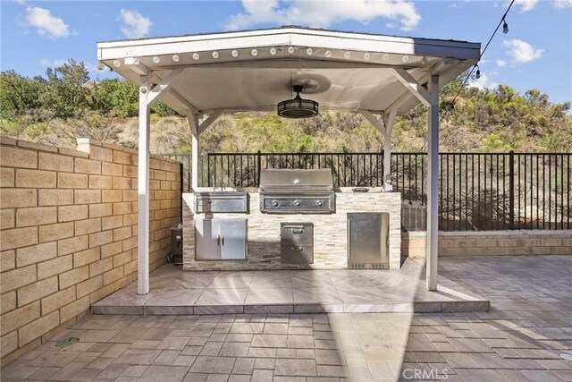 19183 Bension Dr, Saugus, CA 91350 - fenced backyard with a gazebo, exterior kitchen, and a patio